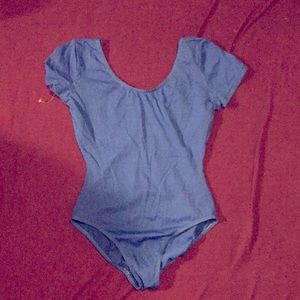 Royal blue bodysuit.